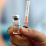 A health worker shows a dose of CoronaVac vaccine during a COVID-19 vaccination campaign in Ankara, Turkey, on Jan. 27, 2021. (Adem Altan/AFP via Getty Images)
