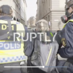 Police detain at least 15 at protest against COVID measures