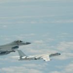 A Taiwanese Air Force F-16 fighter jet flies alongside a Chinese People's Liberation Army Air Force (PLAAF) H-6K bomber in the western Pacific, one of the Chinese military aircraft that reportedly flew over Bashi Channel and Miyako Strait near Japan’s Okinawa island chain on the morning of May 11, 2018. (Released by Taiwan ROC Air Force)