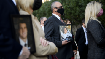 Jaime Puerta holds a portrait of his son Daniel Puerta-Johnson, who died in April 2020 at the age of 16 from a pill containing fentanyl, during a news conference outside the Roybal Federal Building in Los Angeles on February 24, 2021. Photo: Patrick T. Fallon/AFP via Getty Images