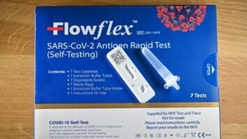 A Flowflex COVID-19 Lateral Flow (LFT) self-test kit, containing a SARS-CoV-2 Antigen Rapid Test, arranged for a photograph, in London on Feb. 20, 2022. (Justin TallisAFP via Getty Images)
