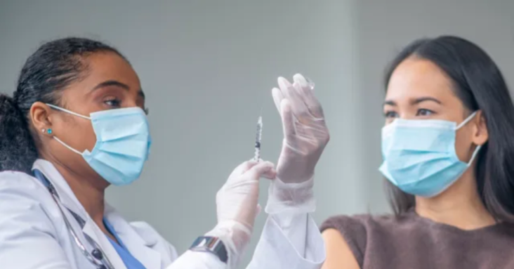 The FDA Just Released a New Warning About This COVID Vaccine Side Effect