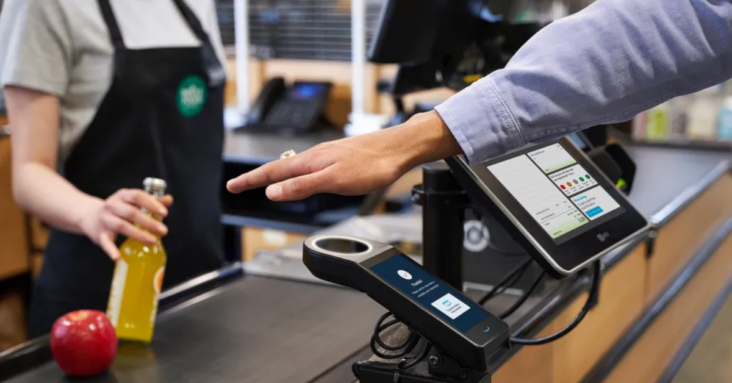 Dozens of Whole Foods stores will soon let you pay with just a scan of your palm