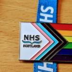 More than 10,000 'Progress Pride' pin badges ordered for Scottish NHS staff are lying unused in storage after 'ideological' scheme was snubbed by health workers