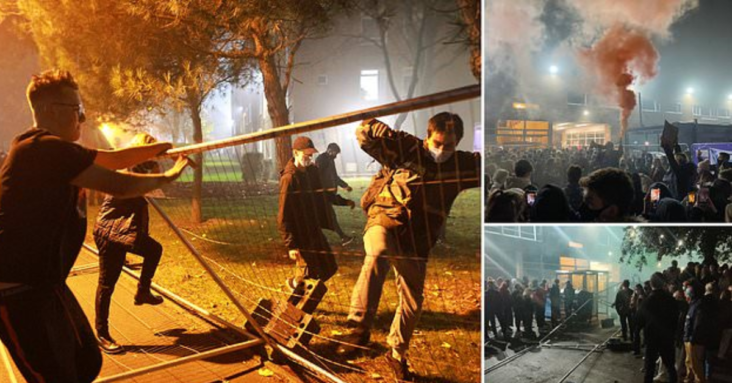 Manchester students pull down lockdown fences around halls of residence