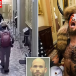 QAnon Shaman Jacob Chansley is released 14 months early from prison after Jan. 6 footage showed him being 'ESCORTED' by cops inside the Capitol