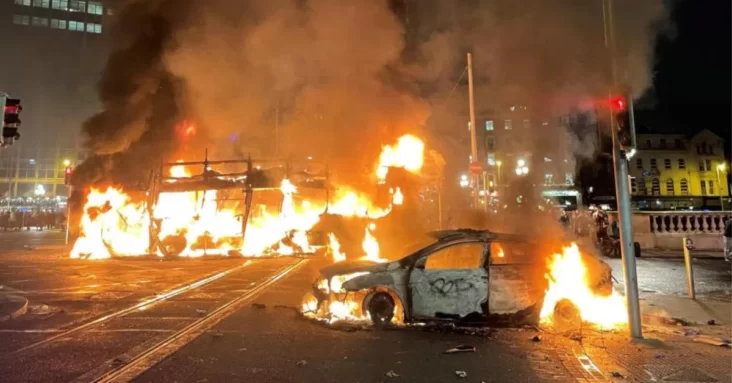 Buses and trams burned in Dublin riots after children injured in knife attack