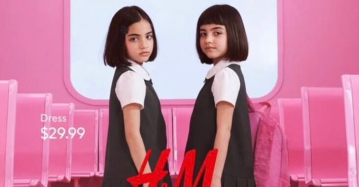 H&M is forced to pull 'sexualised' school uniform advert featuring two young girls in pinafores with the slogan 'make those heads turn'