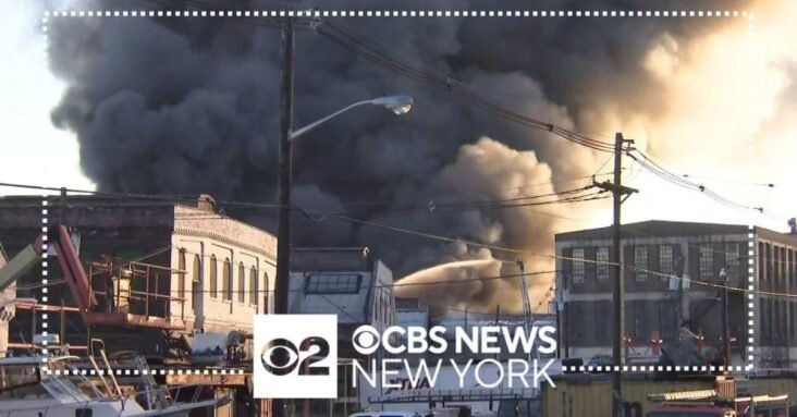 Warehouse fire in Elizabeth, New Jersey still burning after more than 12 hours, but contained, officials say