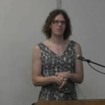 Why is a full-grown man competing against teenage girls in swimming?