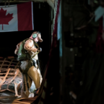 A member of the Air Task Force IMPACT, Air Move Detachment conducts his duties in a CC-130 Hercules aircraft, in Iraq on January 30, 2022. (Credit: Canadian Armed Forces)