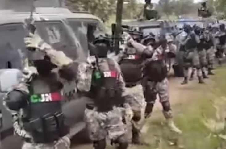 WATCH: Armed masked gunmen in front of armored vehicles chant name of wanted Jalisco Cartel boss